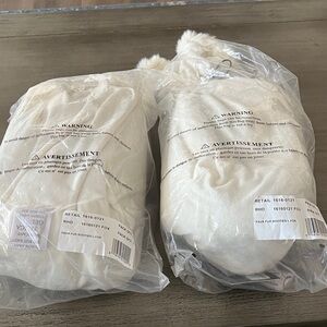 Restoration Hardware Faux Fur Booties White.  I have 2 pairs.  Each pair 20.